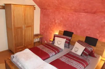 Ein Bett oder Betten in einem Zimmer der Unterkunft Neumann Ferienwohnung Fanning