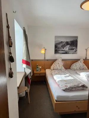 Ein Bett oder Betten in einem Zimmer der Unterkunft Ferienwohnung Saunahaus