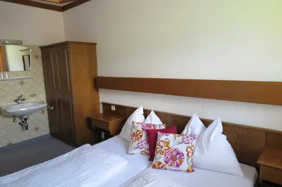 Ein Bett oder Betten in einem Zimmer der Unterkunft Haus Enzian