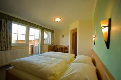 Ein Bett oder Betten in einem Zimmer der Unterkunft Pension Oberhorner