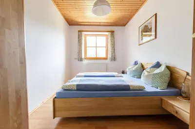 Ein Bett oder Betten in einem Zimmer der Unterkunft Landhaus Katharina