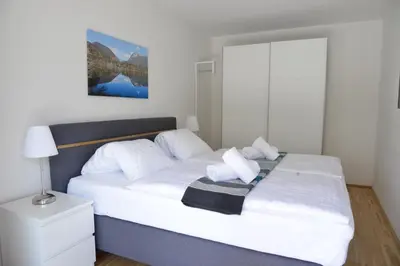 Ein Bett oder Betten in einem Zimmer der Unterkunft Alpine Chalet Ulla Top 3 by AA Holiday Homes