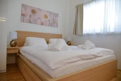 Ein Bett oder Betten in einem Zimmer der Unterkunft Alpine Chalet Pia Top 5 by AA Holiday Homes