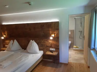 Ein Bett oder Betten in einem Zimmer der Unterkunft Gut Vögeihof