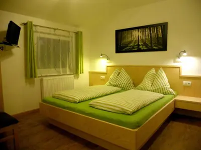 Ein Bett oder Betten in einem Zimmer der Unterkunft Haus Traninger