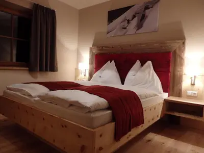 Ein Bett oder Betten in einem Zimmer der Unterkunft Sportlerhof - Alimann UaB