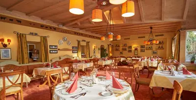 Ein Restaurant oder anderes Speiselokal in der Unterkunft Wohlfühlresort und Feriengut Martinerhof
