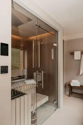 Ein Bett oder Betten in einem Zimmer der Unterkunft Sonnhof Alpendorf - an adults only place