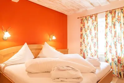 Ein Bett oder Betten in einem Zimmer der Unterkunft Hotel Försterhof lebe pur, genieße den Tag