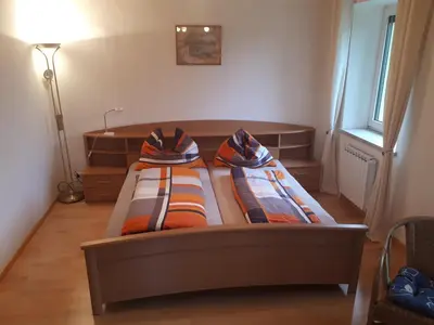Ein Bett oder Betten in einem Zimmer der Unterkunft Haus Verena