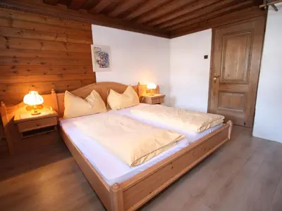 Ein Bett oder Betten in einem Zimmer der Unterkunft Mansion in Eben near Ski Salzburger Sportwelt