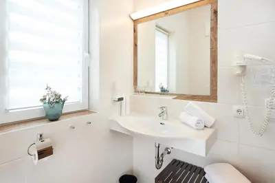 Ein Badezimmer in der Unterkunft Hotel Kerschbaumer