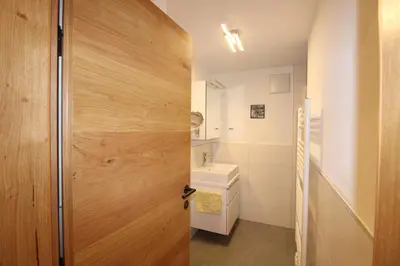 Ein Bett oder Betten in einem Zimmer der Unterkunft Apartmenthaus Vergissmeinnicht
