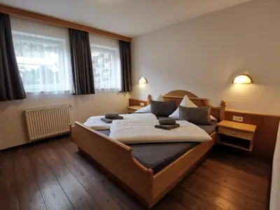 Ein Bett oder Betten in einem Zimmer der Unterkunft Gästehaus Amadé