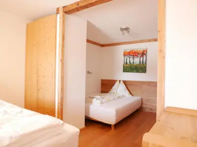 Ein Bett oder Betten in einem Zimmer der Unterkunft Appartements Tauernzauber