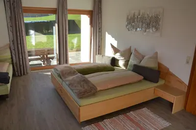 Ein Bett oder Betten in einem Zimmer der Unterkunft Unterbleiwanghof