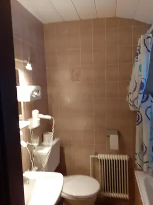 Ein Badezimmer in der Unterkunft Pension Hirlatz
