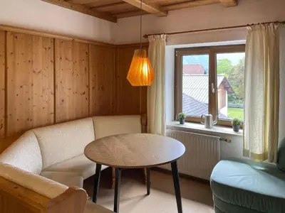 Ein Sitzbereich in der Unterkunft Dormio Gasthof Höllwirt