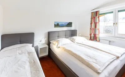 Ein Bett oder Betten in einem Zimmer der Unterkunft Haus Scherz