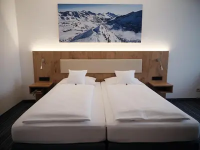 Ein Bett oder Betten in einem Zimmer der Unterkunft Hotel Wagner