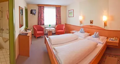 Ein Bett oder Betten in einem Zimmer der Unterkunft Hotel Wagner