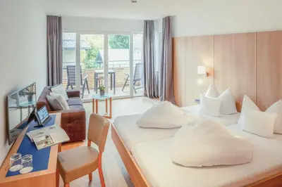 Ein Bett oder Betten in einem Zimmer der Unterkunft Hotel Kendler