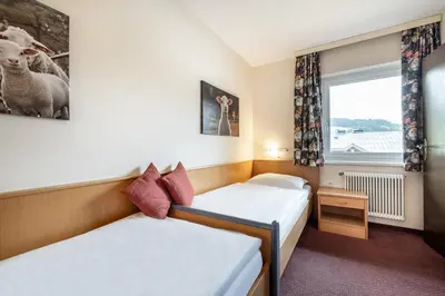 Ein Bett oder Betten in einem Zimmer der Unterkunft Das Filzmoos