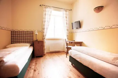 Ein Bett oder Betten in einem Zimmer der Unterkunft Hotel-Gasthof Weitgasser