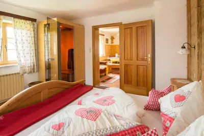 Ein Bett oder Betten in einem Zimmer der Unterkunft Ferienhof Margarethengut