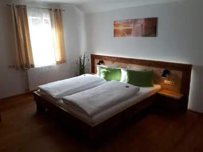 Ein Bett oder Betten in einem Zimmer der Unterkunft Pension Tannhof