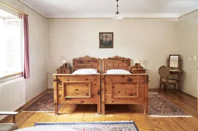 Ein Bett oder Betten in einem Zimmer der Unterkunft Hotel Post Mauterndorf OG