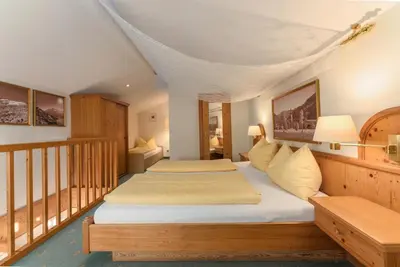 Ein Bett oder Betten in einem Zimmer der Unterkunft Hotel Restaurant Lebzelter