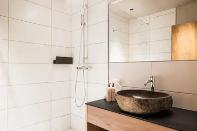 Ein Badezimmer in der Unterkunft Hotel Dorfer