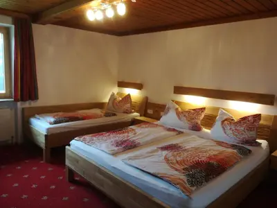 Ein Bett oder Betten in einem Zimmer der Unterkunft Hinterlammerain
