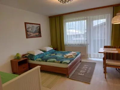 Ein Bett oder Betten in einem Zimmer der Unterkunft Ferienwohnung 6 Bergblick