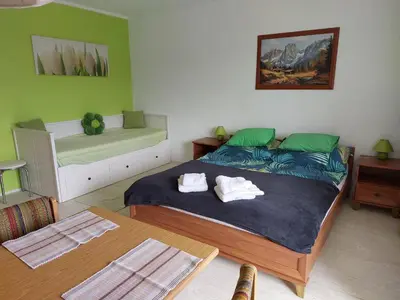 Ein Bett oder Betten in einem Zimmer der Unterkunft Ferienwohnung 6 Bergblick