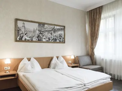 Ein Bett oder Betten in einem Zimmer der Unterkunft Naturhotel Schloss Kassegg