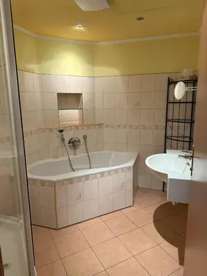 Ein Badezimmer in der Unterkunft Pension ALPENHAUS