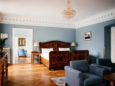 Ein Bett oder Betten in einem Zimmer der Unterkunft TAUROA Landhaus zu Appesbach