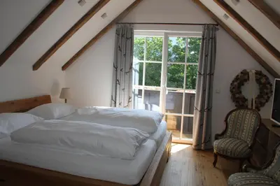 Ein Bett oder Betten in einem Zimmer der Unterkunft Villa Salis