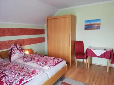 Ein Bett oder Betten in einem Zimmer der Unterkunft Ferienwohnung Marina