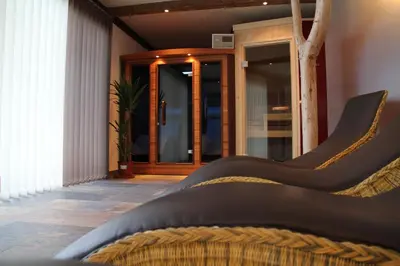 Ein Bett oder Betten in einem Zimmer der Unterkunft Alpenchalet Gosau