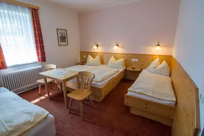 Ein Bett oder Betten in einem Zimmer der Unterkunft Triebenerhof