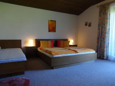 Ein Bett oder Betten in einem Zimmer der Unterkunft Haus Erlbacher