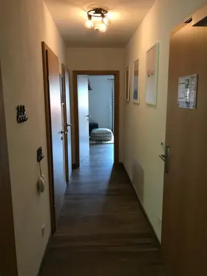 Ein Bett oder Betten in einem Zimmer der Unterkunft Platzhirsch