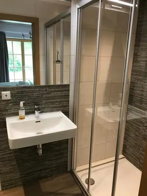 Ein Badezimmer in der Unterkunft Platzhirsch