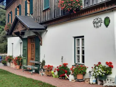 Ein Garten an der Unterkunft Die Traunmühle
