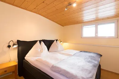 Ein Bett oder Betten in einem Zimmer der Unterkunft Appartement Roland