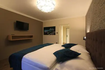 Ein Bett oder Betten in einem Zimmer der Unterkunft Gasthof Alpenblick