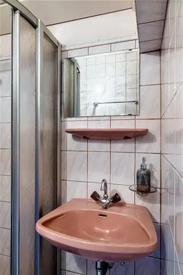 Ein Badezimmer in der Unterkunft Vordersattlegghof